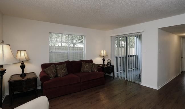 a living room with a wood floor